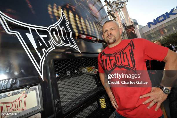 Fighter Chuck Liddell joins TapouT at the 'Thrill the World' shoot, along with thousands of dancers across the globe attempting to set a world record...