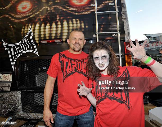 Fighter Chuck Liddell joins TapouT at the 'Thrill the World' shoot, along with thousands of dancers across the globe attempting to set a world record...