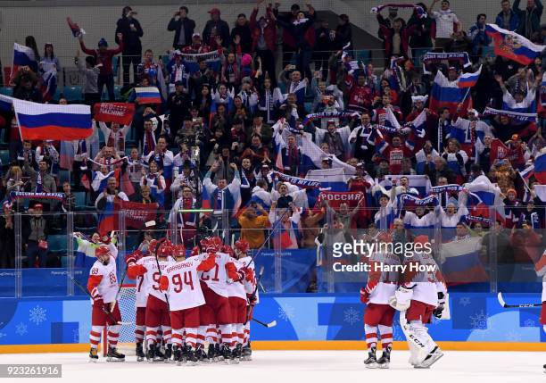 Olympic Athletes from Russia celebrate after defeating Czech Republic 3-0 as fans cheer during the Men's Play-offs Semifinals on day fourteen of the...