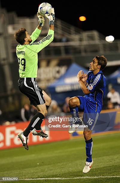 Steve Cronin of the D.C. United blocks an attempted score by KC Wizards in front of Josh Wolff at CommunityAmerica Ballpark on October 24, 2009 in...