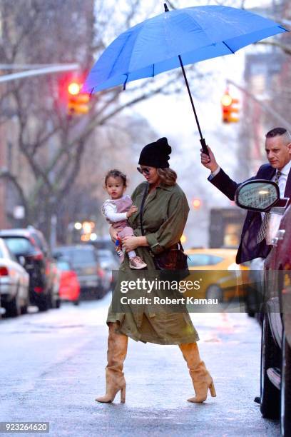 Chrissy Teigen and and her baby Luna Legend seen out and about on a rainy day in Manhattan on February 22, 2018 in New York City.