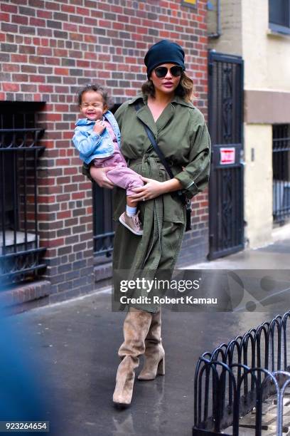 Chrissy Teigen and and baby Luna Legend seen out and about on a rainy day in Manhattan on February 22, 2018 in New York City.