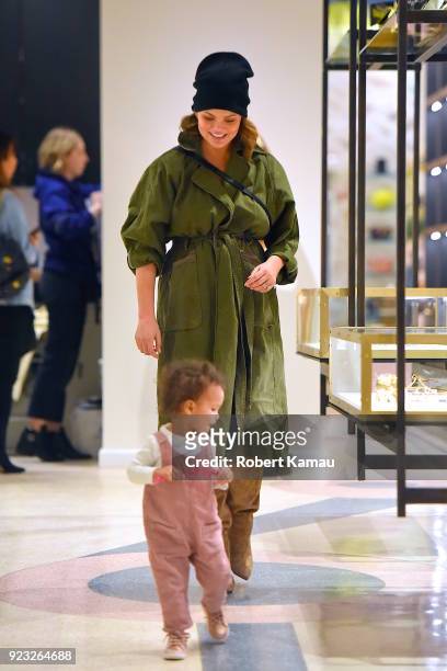 Chrissy Teigen and and her daughter Luna Legend seen out shopping in Manhattan on February 22, 2018 in New York City.
