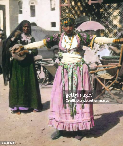 Aarabic dancer. Egypt. Hand-colored lantern slide. Around 1910.