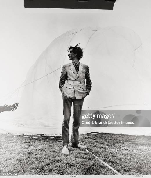 The artist Christo in front of the orangery. DocumentaIV. Auepark, Kassel. Germany Photograph. 1968.