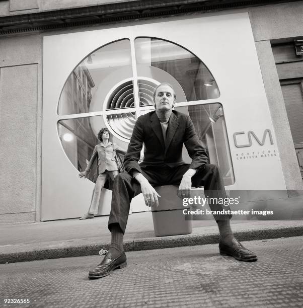 Hans Hollein in front of the CM Boutique of Christa Metek. Austria. Photograph. 1968.