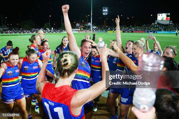 Kim Rennie of the Bulldogs celebrates the win with teammates during the round four AFLW match between the Western Bulldogs and the Carlton Blues at...