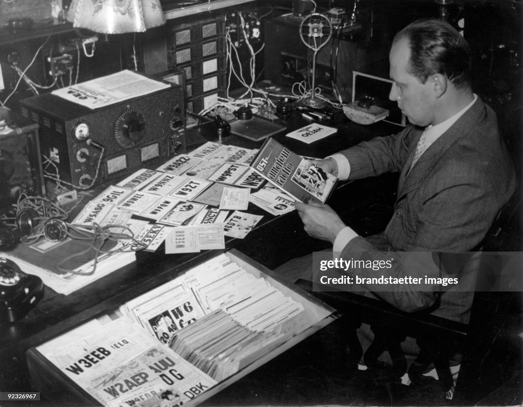 Archduke Anton of Habsburg operating an amateur radio. Austria. Photograph. 1937.