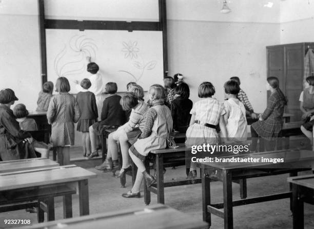 The first school opened after the war in Kagran. Austria, Vienna. Photograph. .