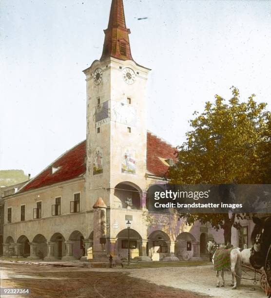 Town hall in Gumpoldskirchen. Vienna Woods. Industrieviertel. Lower Austria. Hand-colored lantern slide. 1912.