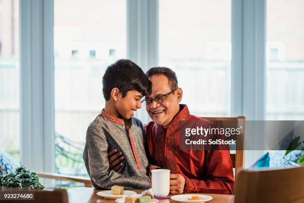 quality time with his grandson - daily life in bangladesh imagens e fotografias de stock