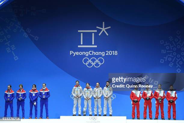 Silver medalists Jan Schmid, Espen Andersen, Jarl Magnus Riiber and Joergen Graabak of Norway, gold medalists Vinzenz Geiger, Fabian Riessle, Eric...