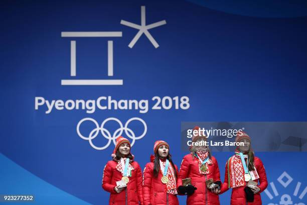 Gold medalists Nadezhda Skardino, Iryna Kryuko, Dzinara Alimbekava and Darya Domracheva of Belarus celebrate during the medal ceremony for Biathlon -...