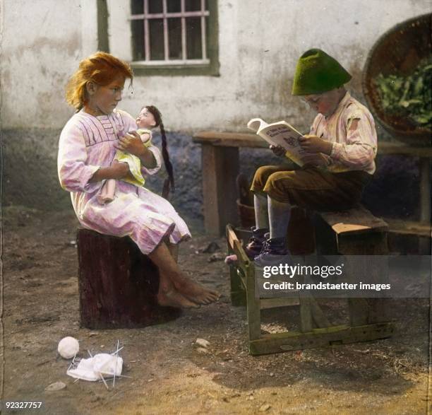 Children playing. Austria. Hand-colored lantern slide. Around 1910.