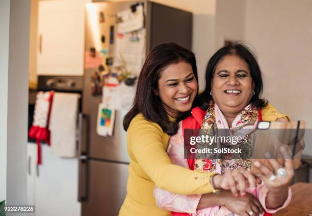 taking a selfie in the kitchen - bangladeshi culture stock pictures, royalty-free photos & images