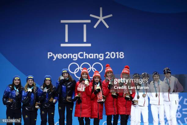 Silver medalists Linn Persson, Mona Brorsson, Anna Magnusson and Hanna Oeberg of Sweden, gold medalists Nadezhda Skardino, Iryna Kryuko, Dzinara...