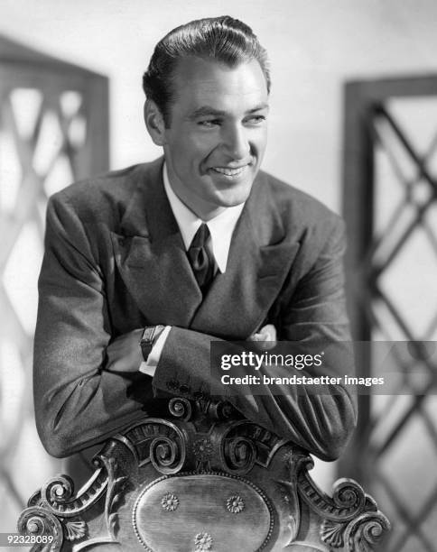 The American film actor Gary Cooper. Photograph. Around 1934.