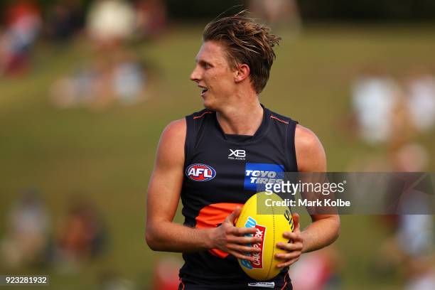 Lachie Whitfield of the Giants runs with the ball during the AFL Inter Club match between the Sydney Swans and the Greater Western Sydney Giants at...
