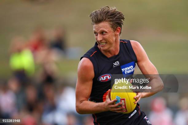 Lachie Whitfield of the Giants runs with the ball during the AFL Inter Club match between the Sydney Swans and the Greater Western Sydney Giants at...