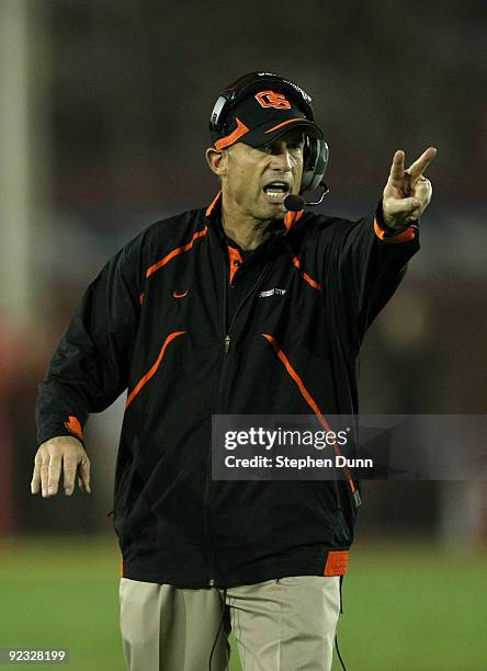 Head coach Mike Riley of the Oregon State Beavers signals in the game with the USC Trojans on October 24, 2009 at the Los Angeles Coliseum in Los...