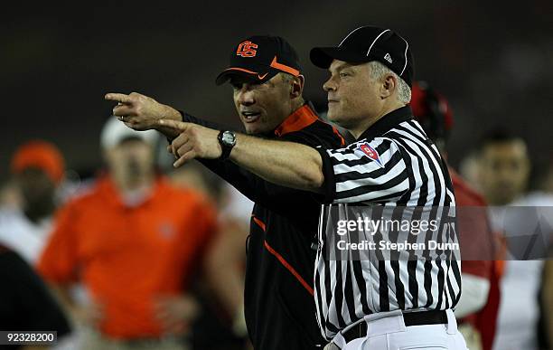 Head coach Mike Riley of the Oregon State Beavers makes a point with an official in the game with the USC Trojans on October 24, 2009 at the Los...