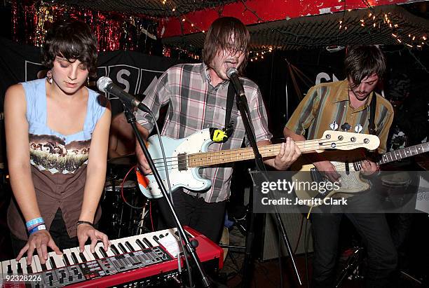 Musicians Cora Foxx, Jonny Bell and Andrew King of Crystal Antlers perform during SESAC's 2009 CMJ Showcase at Cake Shop on October 23, 2009 in New...