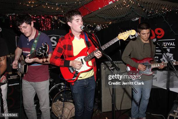 Musicians Brian Black, John Paul Pitts and Thomas Fekete of Surfer Blood perform during SESAC's 2009 CMJ Showcase at Cake Shop on October 23, 2009 in...