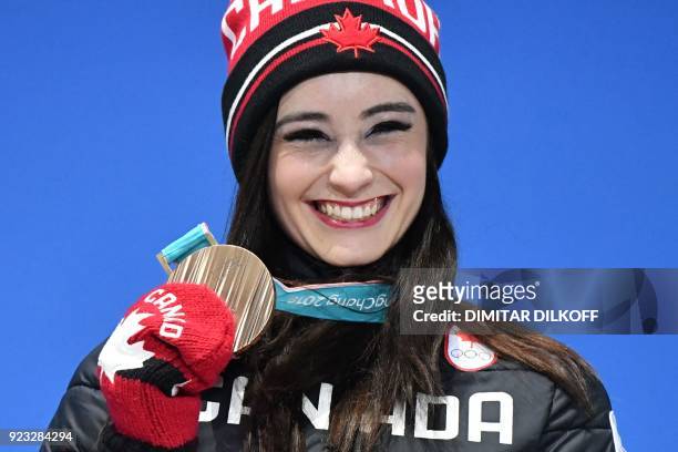 Canada's bronze medallist Kaetlyn Osmond poses on the podium during the medal ceremony for the figure skating women's singles at the Pyeongchang...