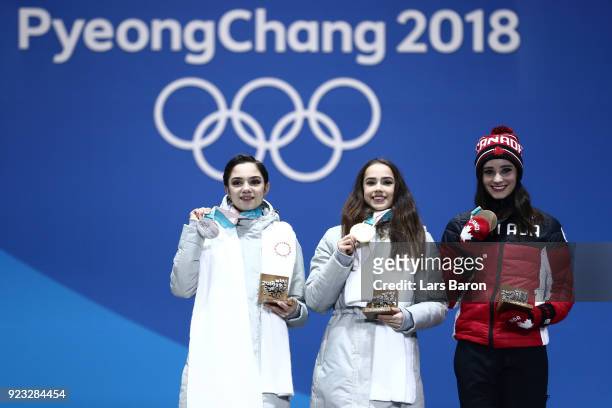 Silver medalist Evgenia Medvedeva of Olympic Athlete from Russia, gold medalist Alina Zagitova of Olympic Athlete from Russia and bronze medalist...