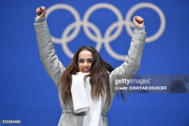 Russia's gold medallist Alina Zagitova poses on the podium during the medal ceremony for the figure skating women's singles at the Pyeongchang Medals...