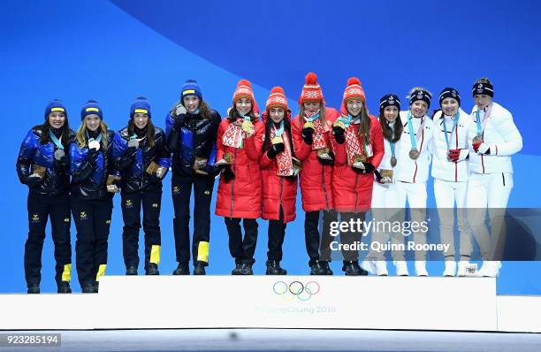Silver medalists Linn Persson, Mona Brorsson, Anna Magnusson and Hanna Oeberg of Sweden, gold medalists Nadezhda Skardino, Iryna Kryuko, Dzinara...