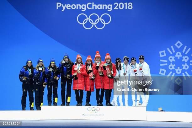 Silver medalists Linn Persson, Mona Brorsson, Anna Magnusson and Hanna Oeberg of Sweden, gold medalists Nadezhda Skardino, Iryna Kryuko, Dzinara...