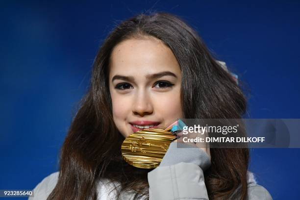 Russia's gold medallist Alina Zagitova poses on the podium during the medal ceremony for the figure skating women's singles at the Pyeongchang Medals...