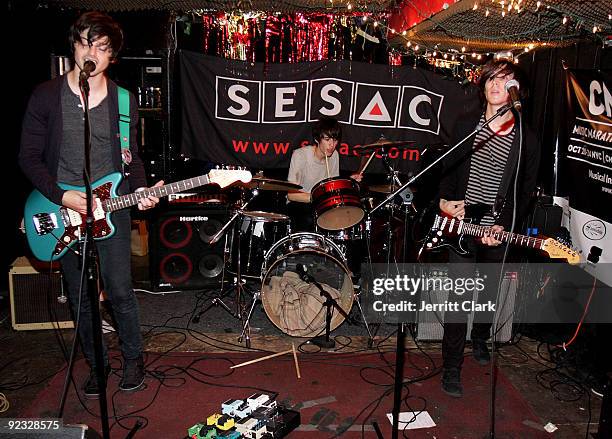 Musicians Kurt Feldman, Anton Hochheim and Christoph Hochheim of The Depreciation Guild performs during SESAC's 2009 CMJ Showcase at Cake Shop on...