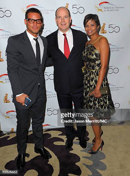 Actor Justin Chambers, HSH Prince Albert II of Monaco, and Keisha Chambers attend the Monte Carlo Television Festival cocktail party held at the...