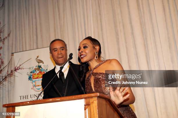 Anchor Maurice DuBois and AFUWI Gala Co-Chair Janell Snowden appear onstage at the 2018 AFUWI Gala at The Pierre Hotel on February 22, 2018 in New...