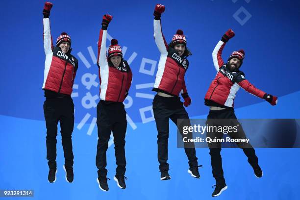 Bronze medalists Samuel Girard, Charles Hamelin, Charle Cournoyer and Pascal Dion of Canada celebrate during the medal ceremony for Short Track Speed...