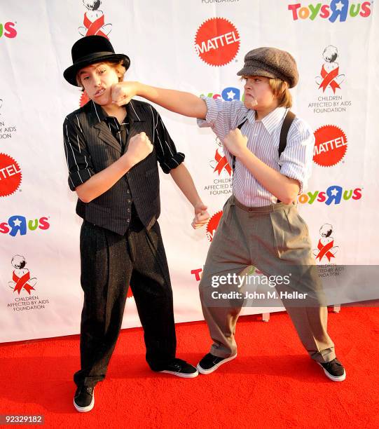 Actors Cole Sprouse and Dylan Sprouse attend the Children Affected by Aids Foundations 16th Annual Dream Halloween at Barker Hanger on October 24,...