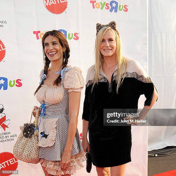 Actresses Hilary Shepard and Daryl Hannah attend the Children Affected by Aids Foundations 16th Annual Dream Halloween at Barker Hanger on October...