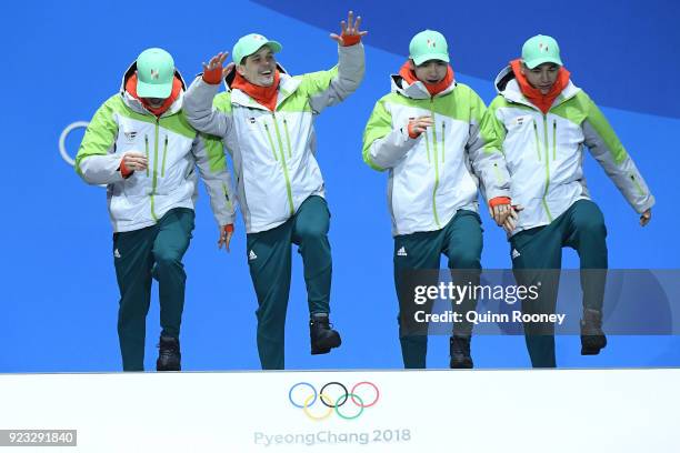 Gold medalists Shaoang Liu, Shaolin Sandor Liu, Viktor Knoch and Csaba Burjan of Hungary celebrate during the medal ceremony for Short Track Speed...