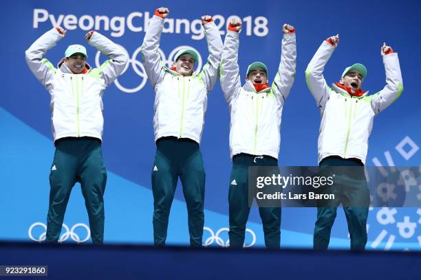 Gold medalists Shaoang Liu, Shaolin Sandor Liu, Viktor Knoch and Csaba Burjan of Hungary celebrate during the medal ceremony for Short Track Speed...