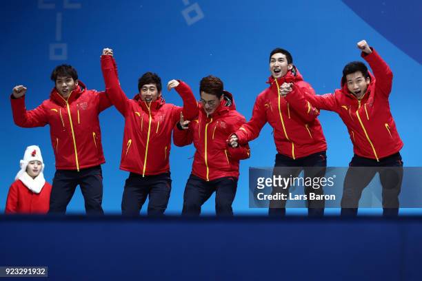 Silver medalists Dajing Wu, Tianyu Han, Hongzhi Xu, Dequan Chen and Ziwei Ren of China celebrate during the medal ceremony for Short Track Speed...