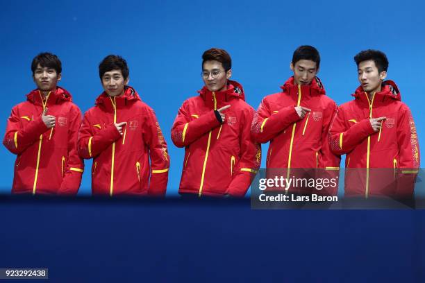 Silver medalists Dajing Wu, Tianyu Han, Hongzhi Xu, Dequan Chen and Ziwei Ren of China stand on the podium during the medal ceremony for Short Track...