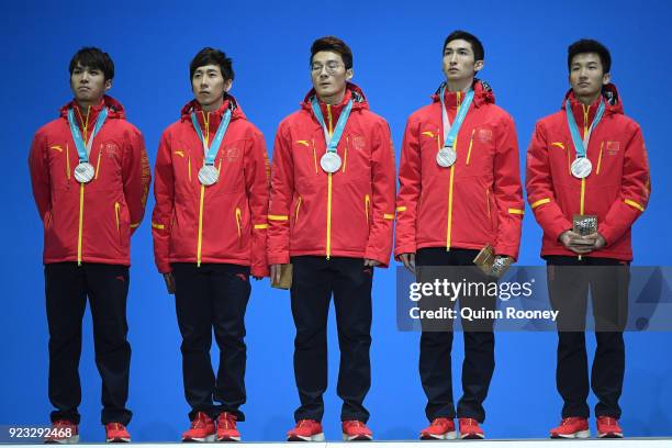 Silver medalists Dajing Wu, Tianyu Han, Hongzhi Xu, Dequan Chen and Ziwei Ren of China stand on the podium during the medal ceremony for Short Track...