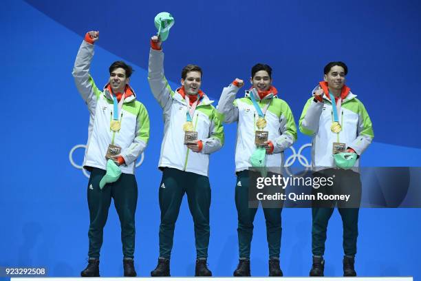 Gold medalists Shaoang Liu, Shaolin Sandor Liu, Viktor Knoch and Csaba Burjan of Hungary celebrate during the medal ceremony for Short Track Speed...