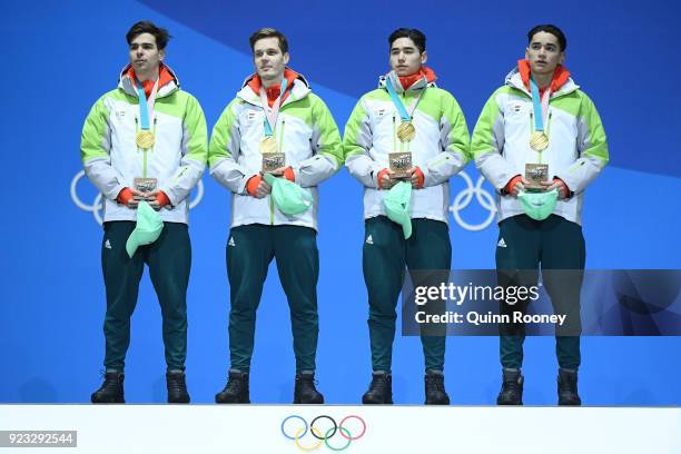 Gold medalists Shaoang Liu, Shaolin Sandor Liu, Viktor Knoch and Csaba Burjan of Hungary stand on the podium during the medal ceremony for Short...