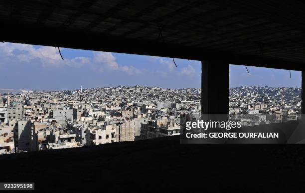 Picture taken on February 23, 2018 from one of the top floors of a building shows a general view of Sheikh Maqsoud neighbourhood in the northern...