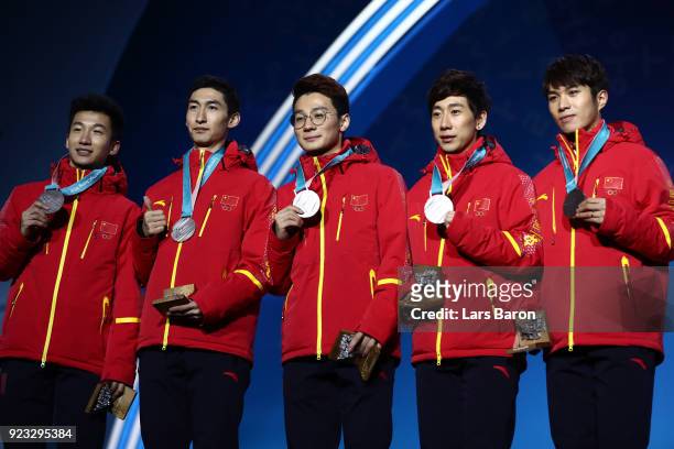 Silver medalists Dajing Wu, Tianyu Han, Hongzhi Xu, Dequan Chen and Ziwei Ren of China celebrate during the medal ceremony for Short Track Speed...