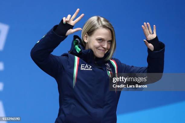 Bronze medalist Arianna Fontana of Italy celebrates during the medal ceremony for Short Track Speed Skating - Ladies' 1,000m on day 14 of the...