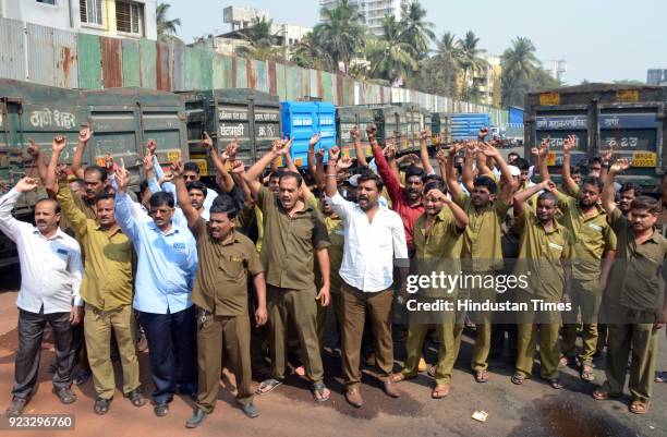 Garbage van workers protest against contractor for low quality uniforms and payments at Ghantagadi Workshop Majiwada, on February 22, 2018 in Mumbai,...